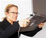  A woman shaking a computer laptop